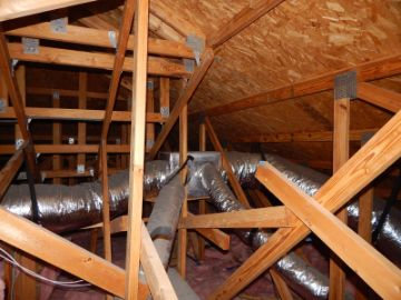Attic trusses, roof decking, and ductwork