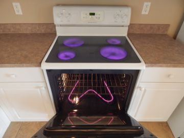 Electric range with all burners and the oven heating during a test