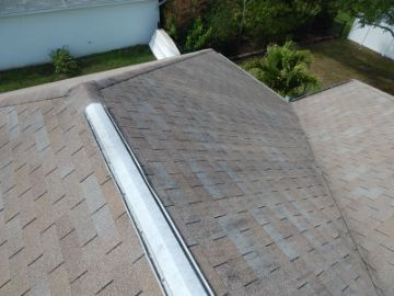 Asphalt shingle roof photographed while walking it